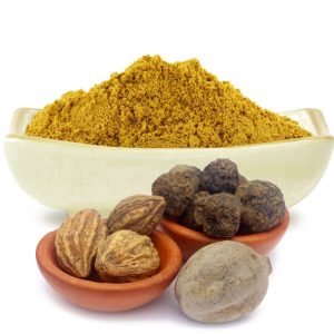 A bowl filled with Indian spices, including Triphala, showcasing vibrant colors and rich textures.