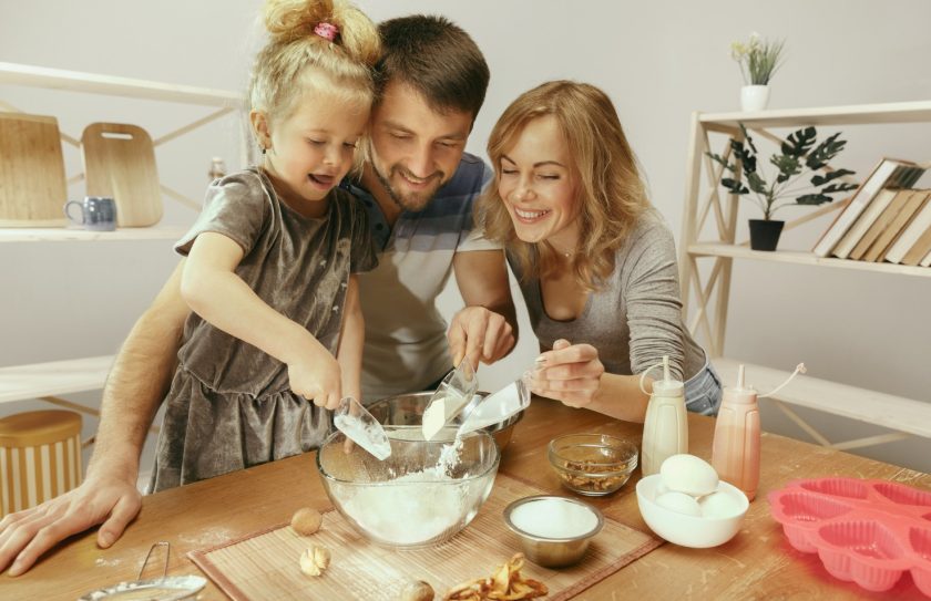 A family enjoying making cookie dough recipe