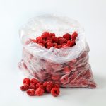 Frozen,Raspberries,In,Clear,Plastic,Bag